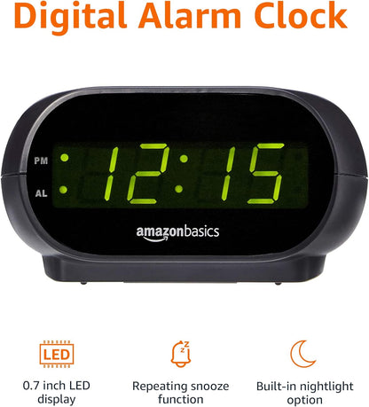 Amazon_Basics_Small_Digital_Oval_Alarm_Clock_with_LED_Display,_Nightlight,_Snooze_Function_&_Battery_Backup,_Black,_4.5_x_3.5_x_2.4_Inches