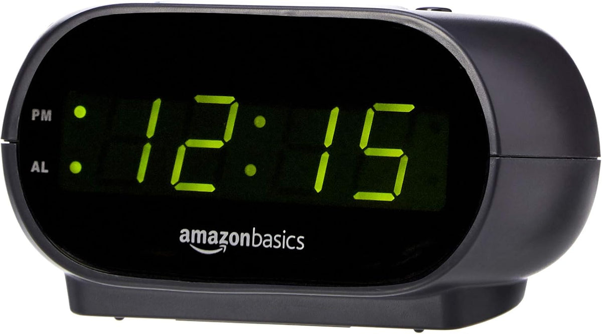 Amazon_Basics_Small_Digital_Oval_Alarm_Clock_with_LED_Display,_Nightlight,_Snooze_Function_&_Battery_Backup,_Black,_4.5_x_3.5_x_2.4_Inches