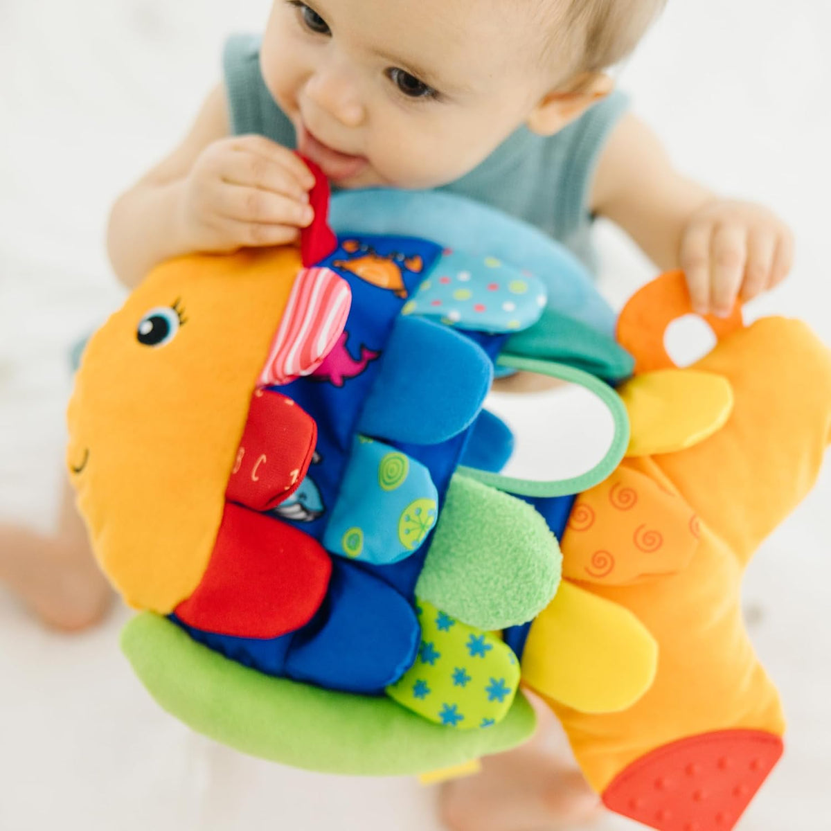 Melissa_&_Doug_K’s_Kids,_Flip_Fish_Stuffed_Animal,_Soft_Baby_Book,_Multi-Textured_Squeaking_&_Crinkling_Infant_Sensory_Toys_for_Babies_with_Baby_Mirror,_Tummy_Time_Toys_for_Infants_Ages_0–9_Months